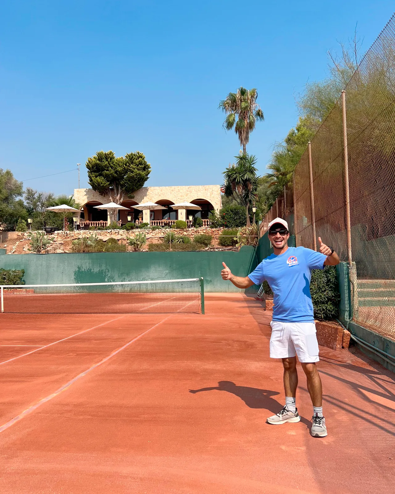 Mediterranean tennis club with palms in Mallorca